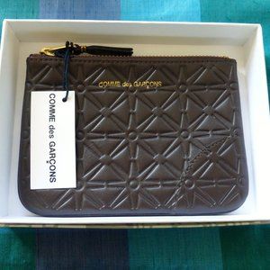 Women's Commes des Garçons NWT brown leather star embossed pouch/coin purse